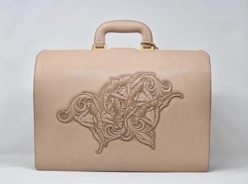 Goatskin Leather Bag with Magnolia Carving, copyright © Takeshi Yonezawa